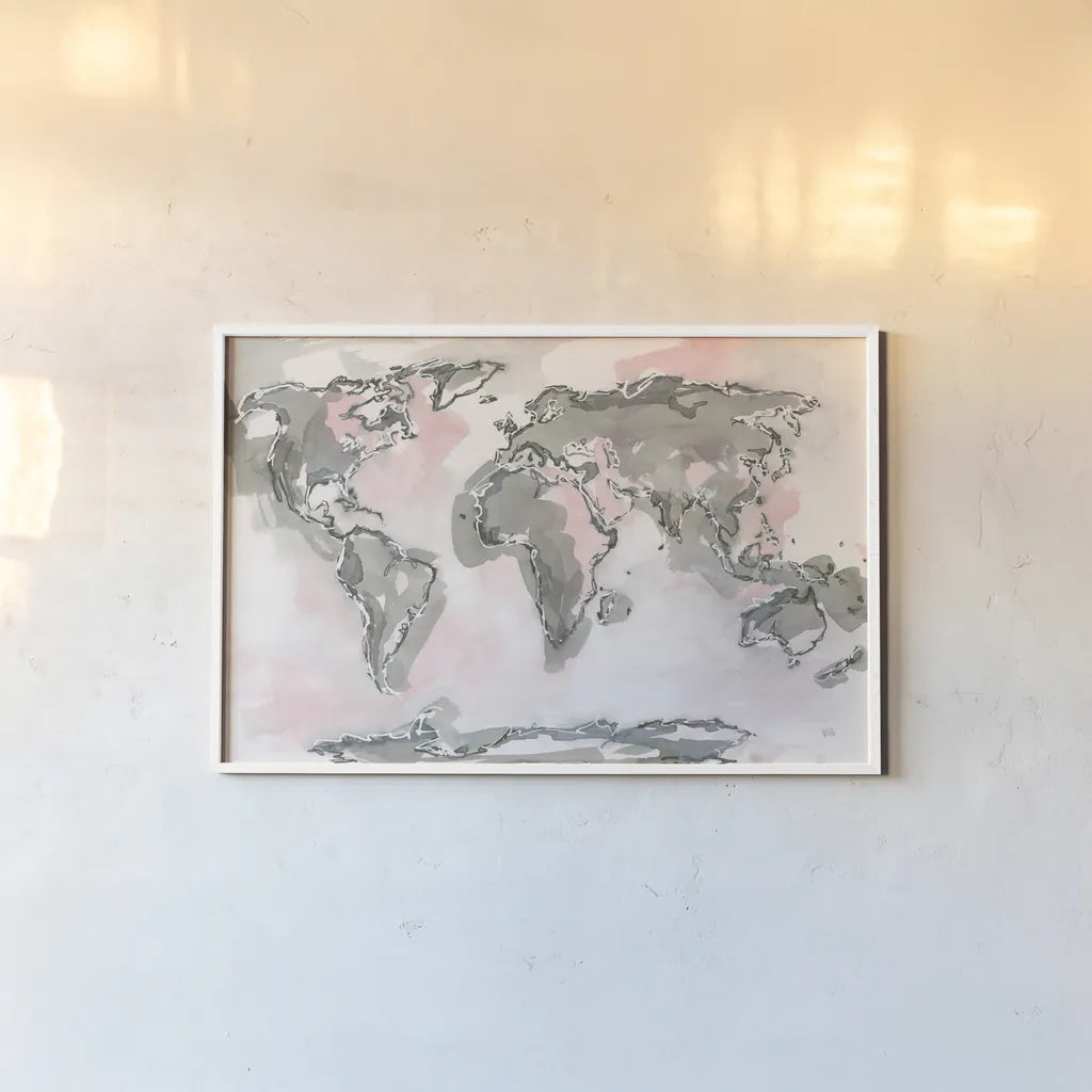 World Map Blush by Chris Paschke. shown as a paper print in a white frame. Available as a archival giclee rolled canvas, fine art paper, or poster print. SKU 53227i.