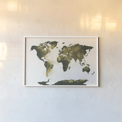 World Map Gold Dust by Chris Paschke. shown as a paper print in a white frame. Available as a archival giclee rolled canvas, fine art paper, or poster print. SKU 53224i.
