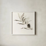 Zen Cranes II Warm by Chris Paschke. Shown in a crisp white glass frame for a clean and minimalist style. Available as an archival giclee rolled canvas, fine art paper, or poster print. SKU 51745a.