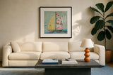 At the Regatta I Sail Sq by Courtney Prahl. Displayed in a glass frame with matte in a clean modern living room. Available as an archival giclee rolled canvas, fine art paper, or poster print. SKU 29777a.