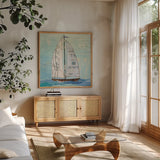 At the Regatta III Sail Sq by Courtney Prahl. Shown in a natural wood frame in a cozy modern living room. Available as an archival giclee rolled canvas, fine art paper, or poster print. SKU 29778a.