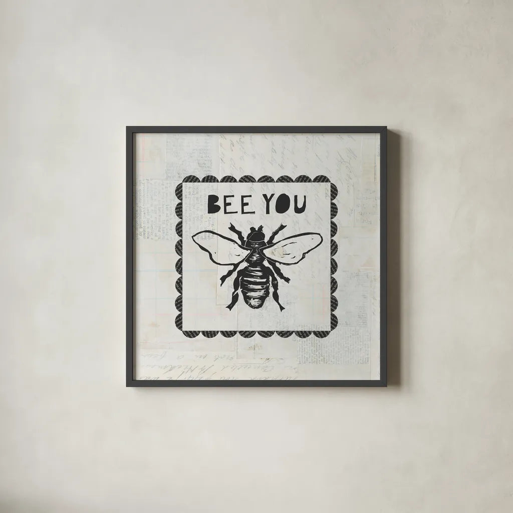 Bee Stamp Bee You by Courtney Prahl. Shown in a sleek black glass frame for a contemporary gallery look. Available as an archival giclee rolled canvas, fine art paper, or poster print. SKU 44528a.
