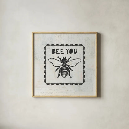 Bee Stamp Bee You by Courtney Prahl. Shown in a natural wood glass frame for a timeless modern aesthetic. Available as an archival giclee rolled canvas, fine art paper, or poster print. SKU 44528a.