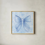 Blue Bow by Courtney Prahl. Shown in a natural wood glass frame for a timeless modern aesthetic. Available as an archival giclee rolled canvas, fine art paper, or poster print. SKU 101031a.