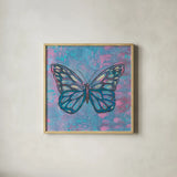 Bright Butterfly I by Courtney Prahl. Shown in a natural wood glass frame for a timeless modern aesthetic. Available as an archival giclee rolled canvas, fine art paper, or poster print. SKU 89304a.