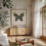 Butterfly Garden I by Courtney Prahl. Shown in a natural wood frame in a cozy modern living room. Available as an archival giclee rolled canvas, fine art paper, or poster print. SKU 54368a.