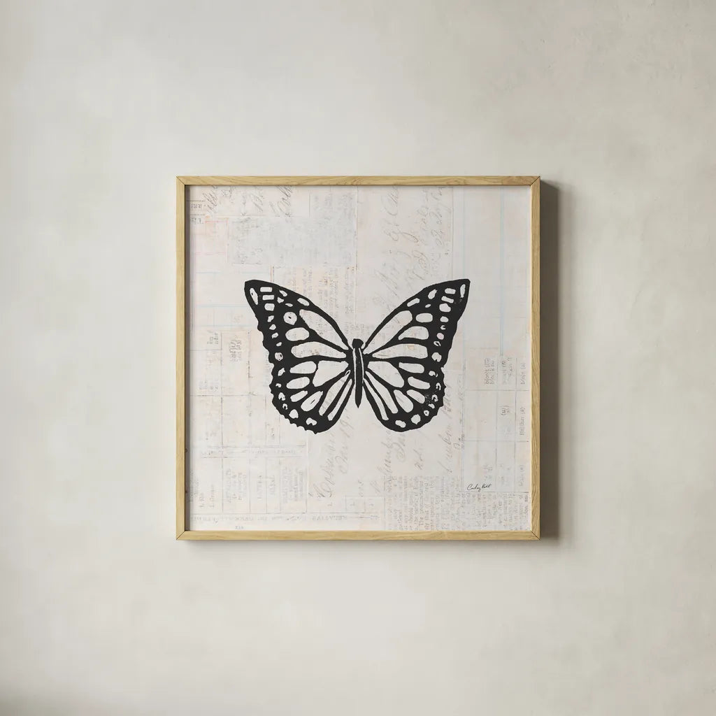Butterfly Stamp BW by Courtney Prahl. Shown in a natural wood glass frame for a timeless modern aesthetic. Available as an archival giclee rolled canvas, fine art paper, or poster print. SKU 54279a.