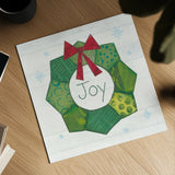 Christmas Patchwork II by Courtney Prahl. Shown as a detailed flat fine art print, highlighting archival giclee quality. Available as an archival giclee rolled canvas, fine art paper, or poster print. SKU 38467a.