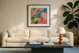 Floral Gift II by Courtney Prahl. Displayed in a glass frame with matte in a clean modern living room. Available as an archival giclee rolled canvas, fine art paper, or poster print. SKU 103368a.