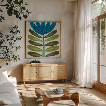 Folk Flower by Courtney Prahl. Shown in a natural wood frame in a cozy modern living room. Available as an archival giclee rolled canvas, fine art paper, or poster print. SKU 96977a.