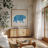 Geometric Animal I by Courtney Prahl. Shown in a natural wood frame in a cozy modern living room. Available as an archival giclee rolled canvas, fine art paper, or poster print. SKU 48979a.