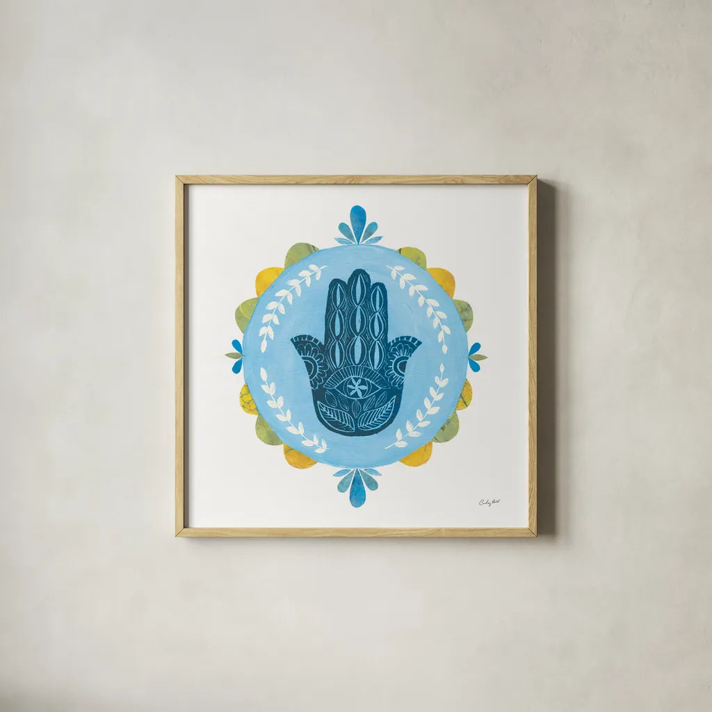 Hamsa Mandala I by Courtney Prahl. Shown in a natural wood glass frame for a timeless modern aesthetic. Available as an archival giclee rolled canvas, fine art paper, or poster print. SKU 76297a.