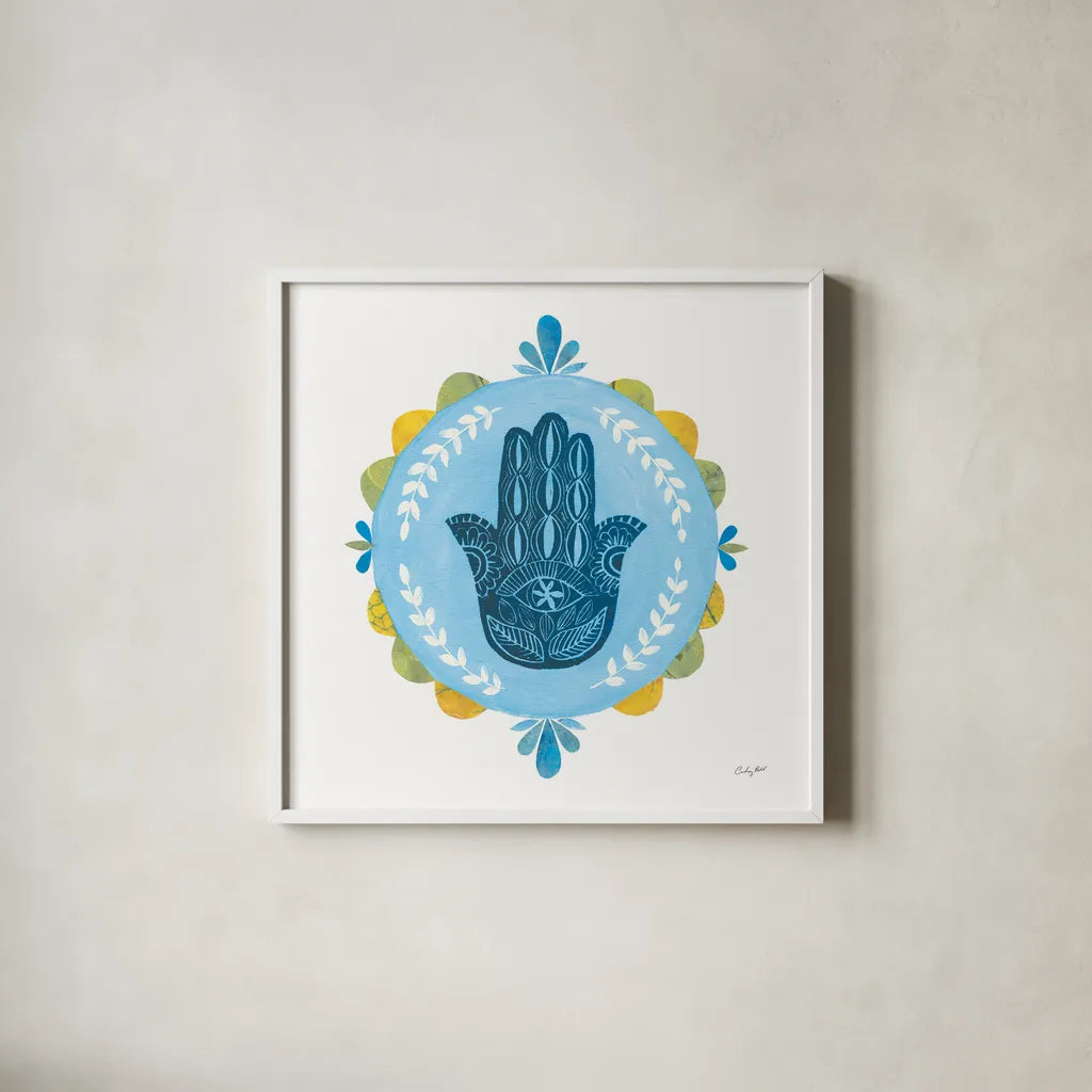 Hamsa Mandala I by Courtney Prahl. Shown in a crisp white glass frame for a clean and minimalist style. Available as an archival giclee rolled canvas, fine art paper, or poster print. SKU 76297a.