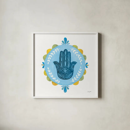Hamsa Mandala I by Courtney Prahl. Shown in a crisp white glass frame for a clean and minimalist style. Available as an archival giclee rolled canvas, fine art paper, or poster print. SKU 76297a.