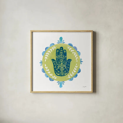 Hamsa Mandala II by Courtney Prahl. Shown in a natural wood glass frame for a timeless modern aesthetic. Available as an archival giclee rolled canvas, fine art paper, or poster print. SKU 76298a.