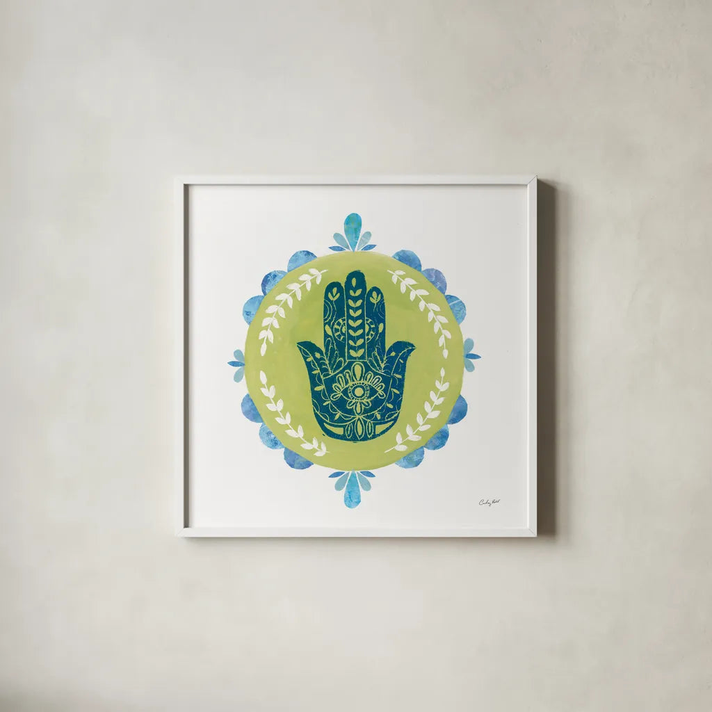 Hamsa Mandala II by Courtney Prahl. Shown in a crisp white glass frame for a clean and minimalist style. Available as an archival giclee rolled canvas, fine art paper, or poster print. SKU 76298a.