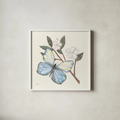 In the Garden Butterfly by Courtney Prahl. Shown in a crisp white glass frame for a clean and minimalist style. Available as an archival giclee rolled canvas, fine art paper, or poster print. SKU 68237a.