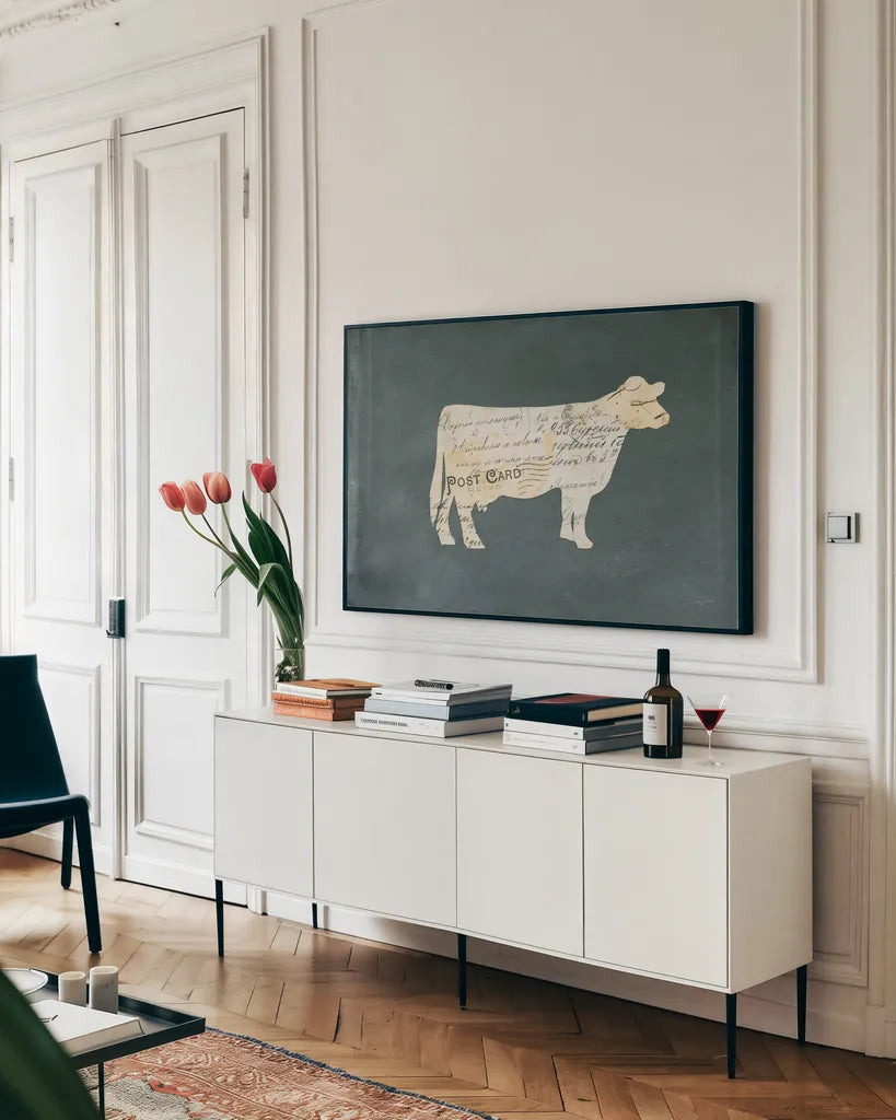 La Vache Cameo by Courtney Prahl. shown as a framed stretched canvas in a living room above a console. Available as a archival giclee rolled canvas, fine art paper, or poster print. SKU 52524i.