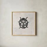 Ladybug Stamp BW by Courtney Prahl. Shown in a natural wood glass frame for a timeless modern aesthetic. Available as an archival giclee rolled canvas, fine art paper, or poster print. SKU 54281a.