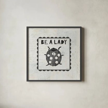Ladybug Stamp Be A Lady by Courtney Prahl. Shown in a sleek black glass frame for a contemporary gallery look. Available as an archival giclee rolled canvas, fine art paper, or poster print. SKU 52084a.