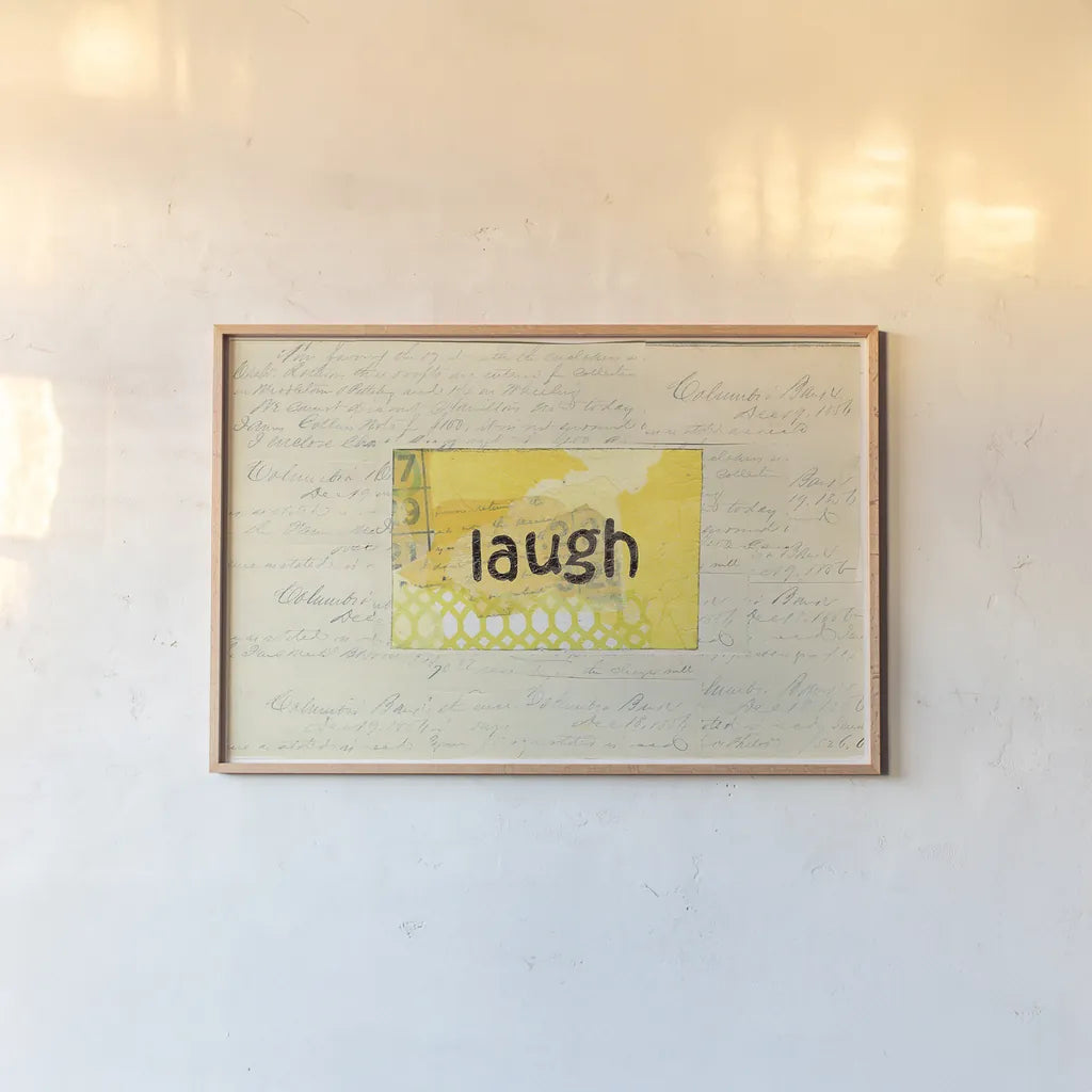 Laugh Collage by Courtney Prahl. shown as a paper print in a natural frame. Available as a archival giclee rolled canvas, fine art paper, or poster print. SKU 52562i.