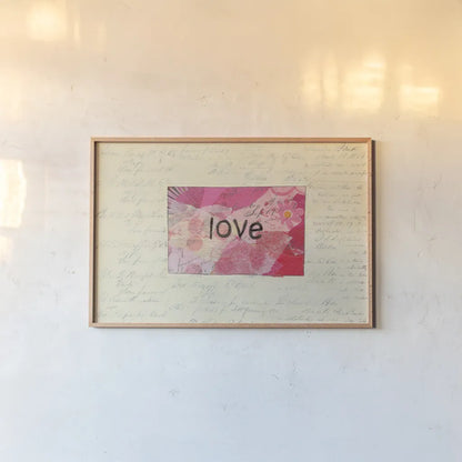 Love Collage by Courtney Prahl. shown as a paper print in a natural frame. Available as a archival giclee rolled canvas, fine art paper, or poster print. SKU 52563i.