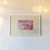 Love Collage by Courtney Prahl. shown as a paper print in a white frame. Available as a archival giclee rolled canvas, fine art paper, or poster print. SKU 52563i.