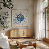 Nautical Collage I by Courtney Prahl. Shown in a natural wood frame in a cozy modern living room. Available as an archival giclee rolled canvas, fine art paper, or poster print. SKU 32800a.