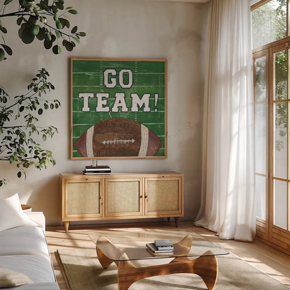 On the Field I Go Team by Courtney Prahl. Shown in a natural wood frame in a cozy modern living room. Available as an archival giclee rolled canvas, fine art paper, or poster print. SKU 32958a.