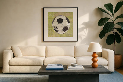 Play Ball III by Courtney Prahl. Displayed in a glass frame with matte in a clean modern living room. Available as an archival giclee rolled canvas, fine art paper, or poster print. SKU 13263a.