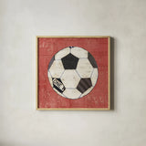 Play Ball III Red by Courtney Prahl. Shown in a natural wood glass frame for a timeless modern aesthetic. Available as an archival giclee rolled canvas, fine art paper, or poster print. SKU 63512a.
