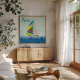 Rainbow Spinnakers I by Courtney Prahl. Shown in a natural wood frame in a cozy modern living room. Available as an archival giclee rolled canvas, fine art paper, or poster print. SKU 37516a.