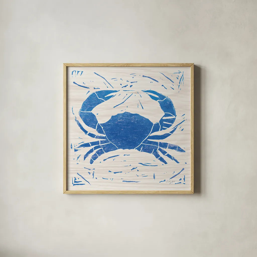 Sea Creature Crab Blue by Courtney Prahl. Shown in a natural wood glass frame for a timeless modern aesthetic. Available as an archival giclee rolled canvas, fine art paper, or poster print. SKU 21278a.