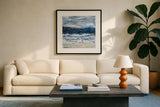 Seaside Escape II by Courtney Prahl. Displayed in a glass frame with matte in a clean modern living room. Available as an archival giclee rolled canvas, fine art paper, or poster print. SKU 61964a.