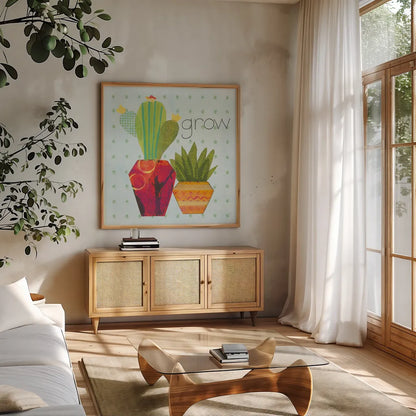 Southwest Cactus II by Courtney Prahl. Shown in a natural wood frame in a cozy modern living room. Available as an archival giclee rolled canvas, fine art paper, or poster print. SKU 37390a.