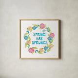 Spring Has Sprung II by Courtney Prahl. Shown in a natural wood glass frame for a timeless modern aesthetic. Available as an archival giclee rolled canvas, fine art paper, or poster print. SKU 43716a.