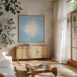 Tropical Fun Palms Silhouette III by Courtney Prahl. Shown in a natural wood frame in a cozy modern living room. Available as an archival giclee rolled canvas, fine art paper, or poster print. SKU 35709a.
