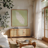 Tropical Fun Palms Silhouette IV by Courtney Prahl. Shown in a natural wood frame in a cozy modern living room. Available as an archival giclee rolled canvas, fine art paper, or poster print. SKU 35710a.