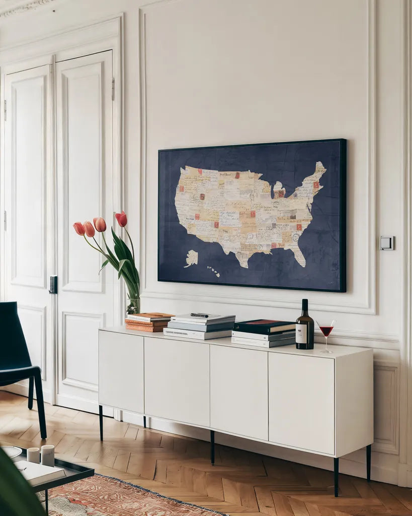 Vintage USA on Indigo by Courtney Prahl. shown as a framed stretched canvas in a living room above a console. Available as a archival giclee rolled canvas, fine art paper, or poster print. SKU 53853i.