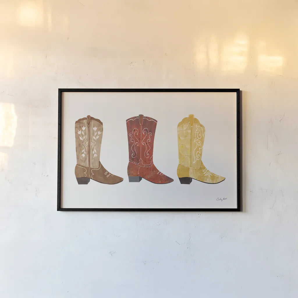 Western Cowgirl Boot VII by Courtney Prahl. shown as a paper print in a black flame. Available as a archival giclee rolled canvas, fine art paper, or poster print. SKU 81379i.
