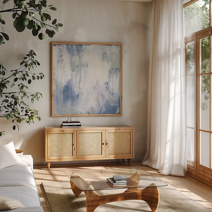 White Out I by Courtney Prahl. Shown in a natural wood frame in a cozy modern living room. Available as an archival giclee rolled canvas, fine art paper, or poster print. SKU 64279a.