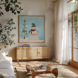 Winter Fun IV by Courtney Prahl. Shown in a natural wood frame in a cozy modern living room. Available as an archival giclee rolled canvas, fine art paper, or poster print. SKU 24289a.