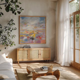 A Colorful Land by Danhui Nai. Shown in a natural wood frame in a cozy modern living room. Available as an archival giclee rolled canvas, fine art paper, or poster print. SKU 69061a.