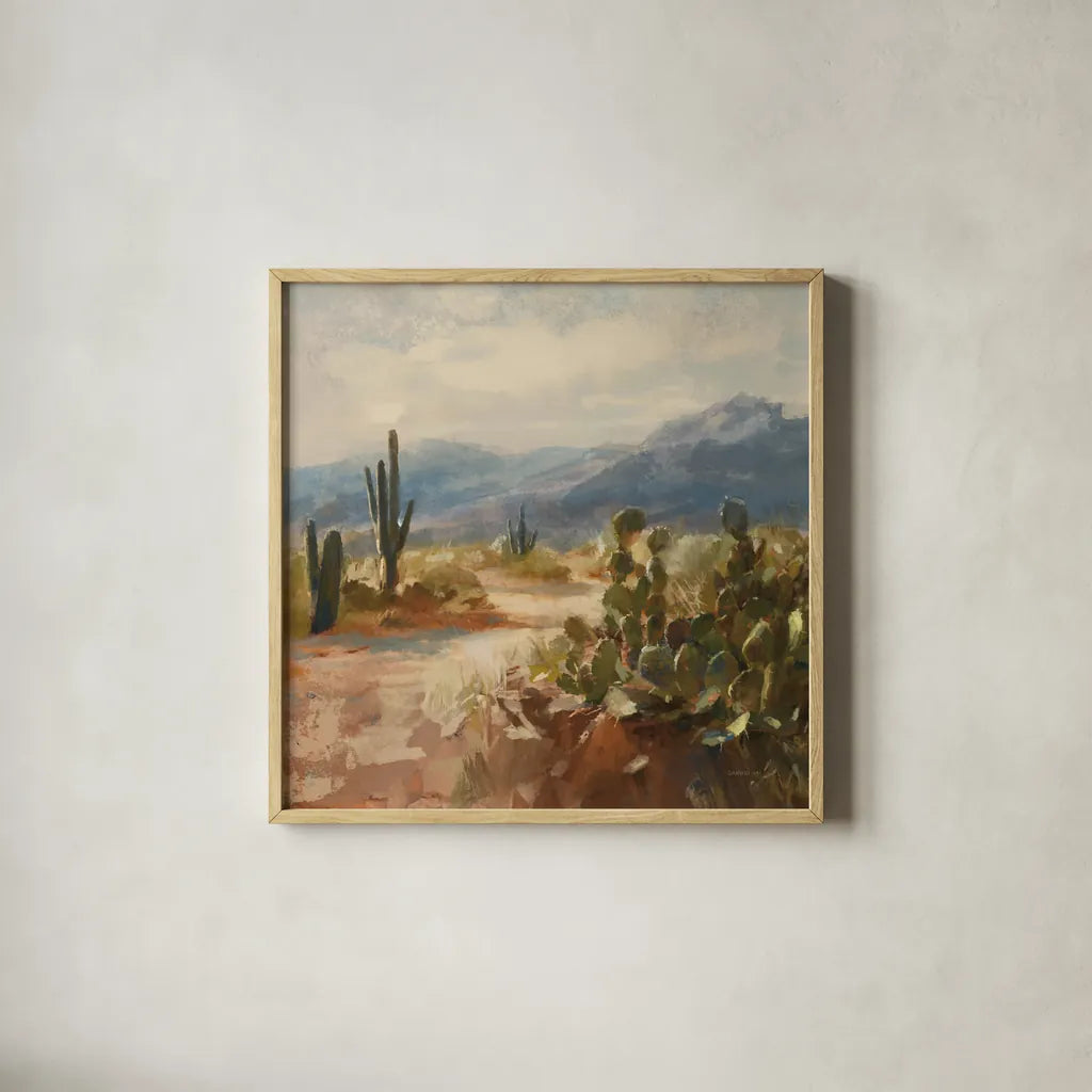 A Desert Journey by Danhui Nai. Shown in a natural wood glass frame for a timeless modern aesthetic. Available as an archival giclee rolled canvas, fine art paper, or poster print. SKU 90888a.