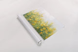 A Row of Yellow Blossoms by Danhui Nai. shown as a rolled paper print. Available as archival giclee rolled canvas, fine art paper, or poster print. SKU 100173i.