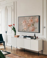 A Sprig of Roses I by Danhui Nai. shown as a framed stretched canvas in a living room above a console. Available as a archival giclee rolled canvas, fine art paper, or poster print. SKU 100081i.