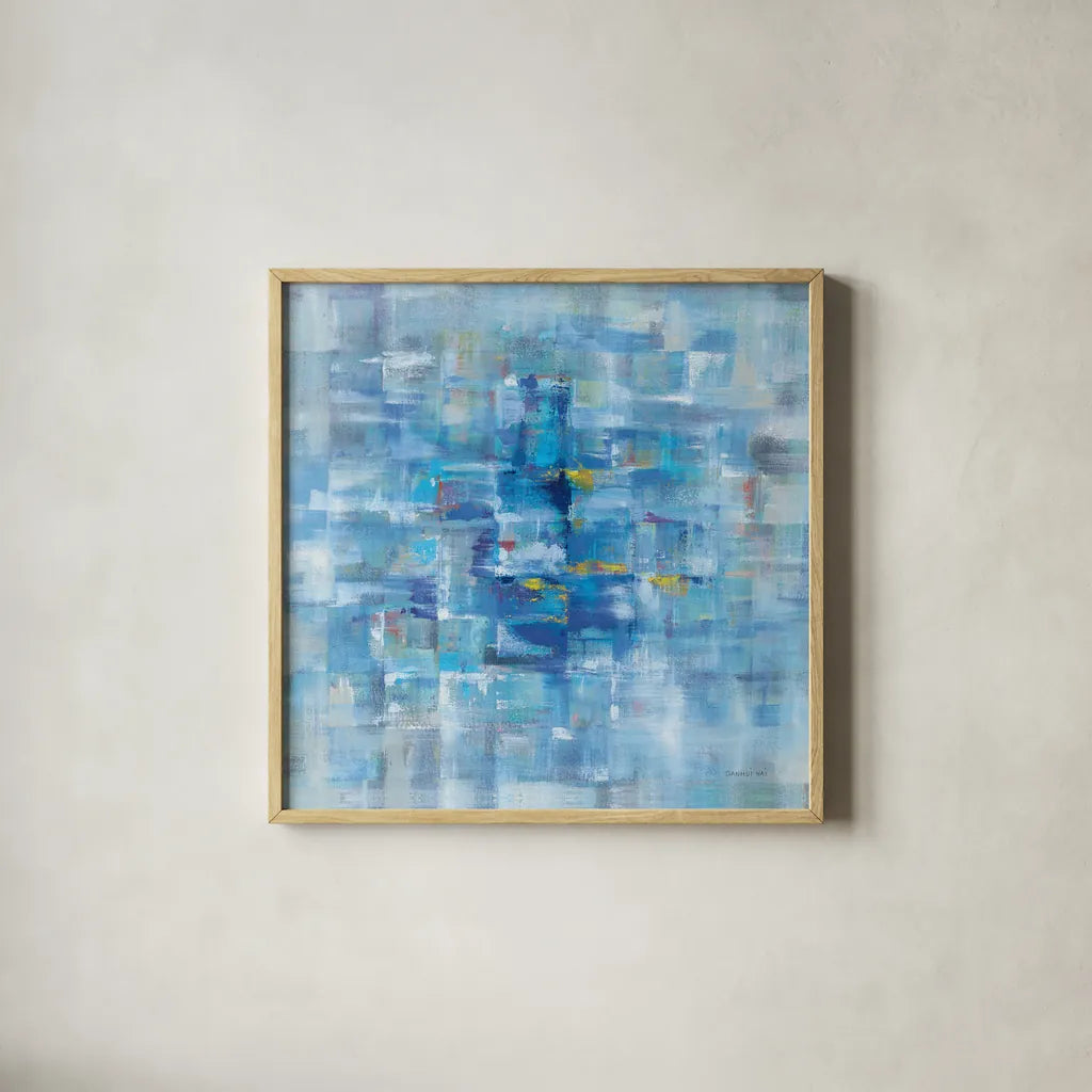 Abstract Squares Blue by Danhui Nai. Shown in a natural wood glass frame for a timeless modern aesthetic. Available as an archival giclee rolled canvas, fine art paper, or poster print. SKU 49976a.