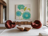 Aqua Blooms on Wood II by Danhui Nai. Shown as extra-large giant wall art in a modern living room. Available as an archival giclee rolled canvas, fine art paper, or poster print. SKU 92015a.