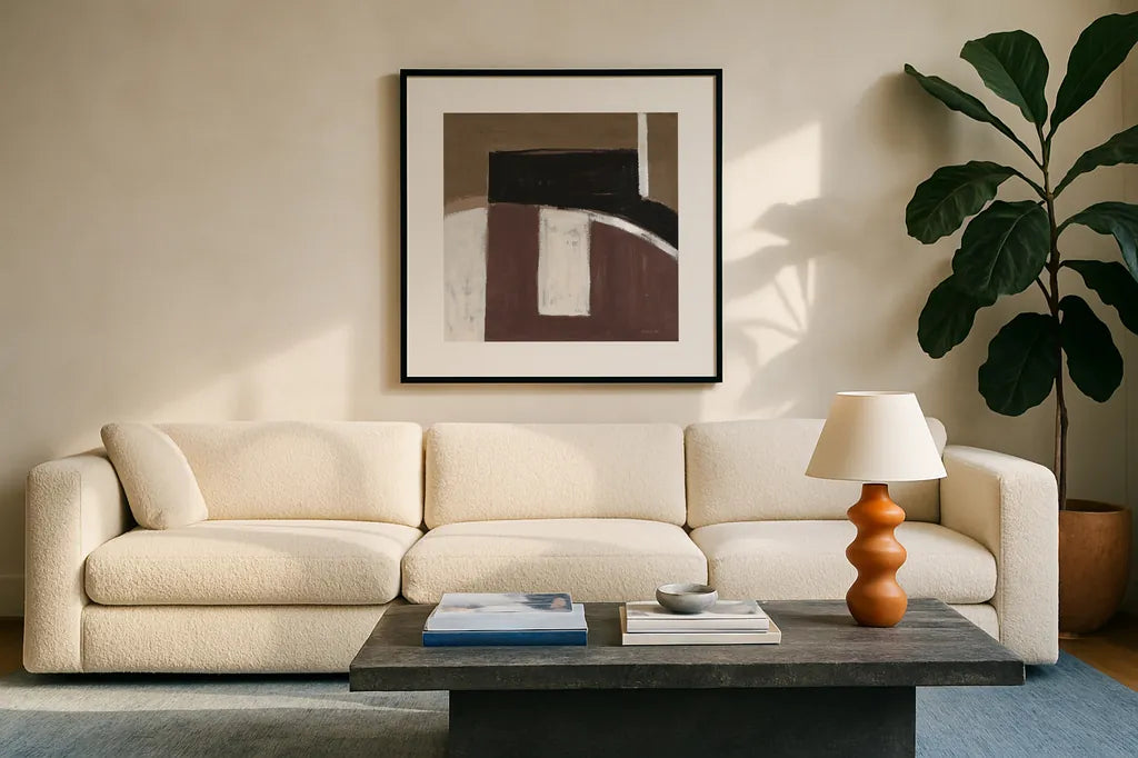 Balancing Act Brown by Danhui Nai. Displayed in a glass frame with matte in a clean modern living room. Available as an archival giclee rolled canvas, fine art paper, or poster print. SKU 85457a.