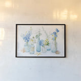 Beach Cottage Florals I by Danhui Nai. shown as a paper print in a black flame. Available as a archival giclee rolled canvas, fine art paper, or poster print. SKU 47119i.